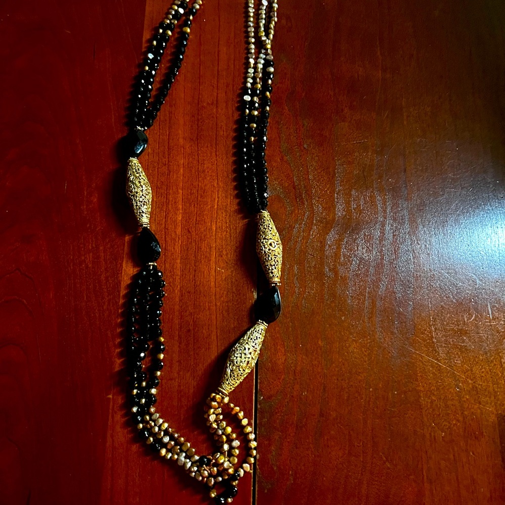 Beautiful designer multi media necklace. Gently used